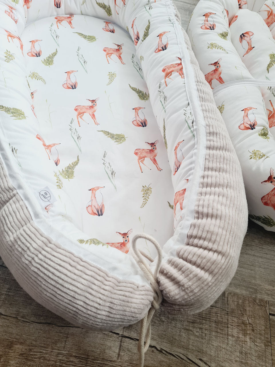 Babynestchen "Waldtiere" Cord sand